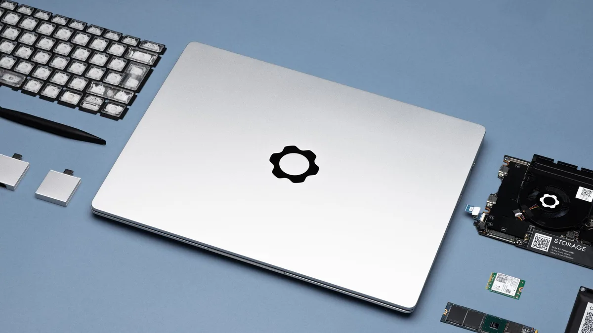 Framework Laptop price cut cover with modular laptop parts and memory chips