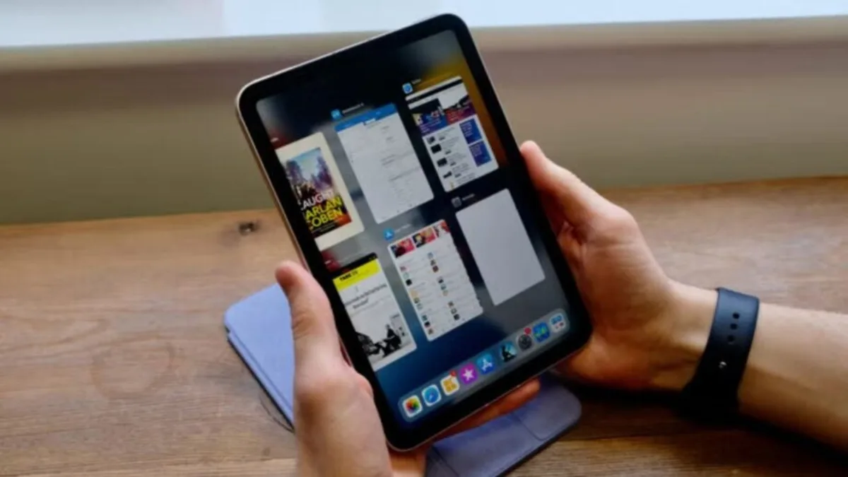 OLED iPad mini report cover with compact tablet and vivid display concept