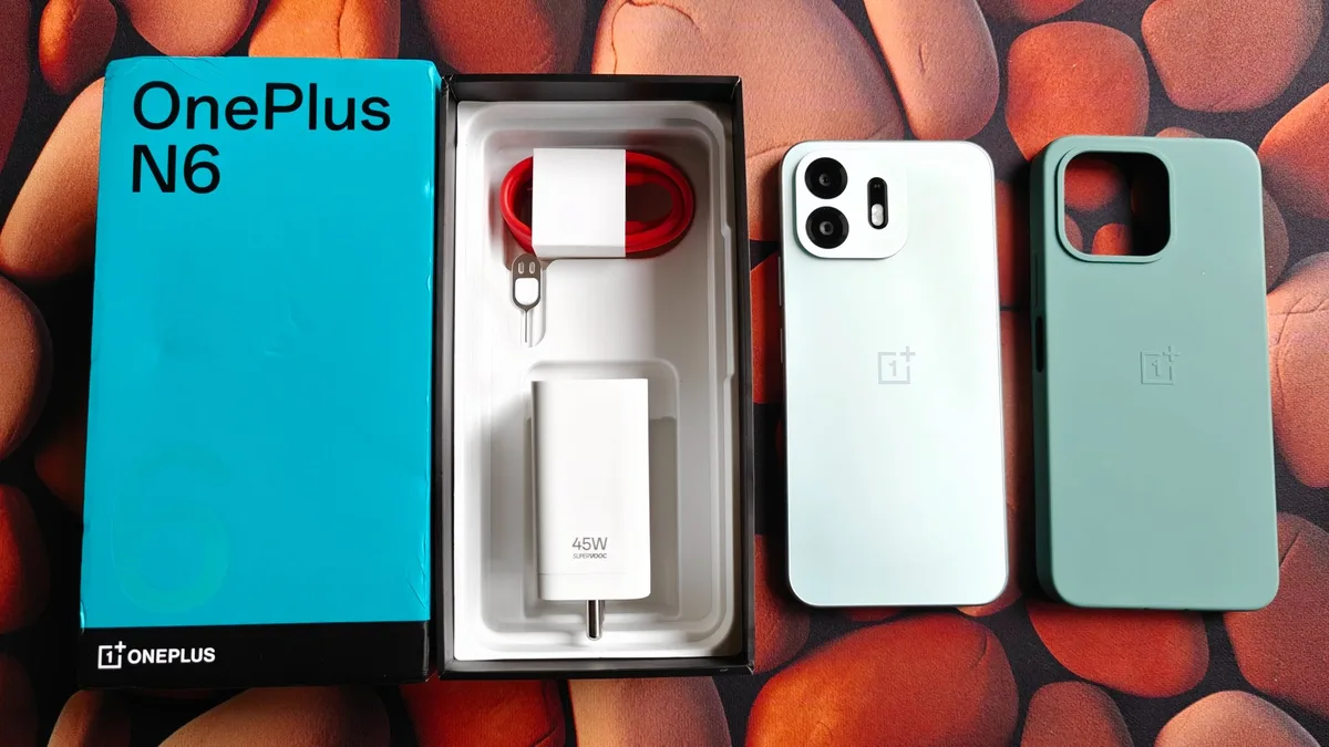OnePlus N6 retail box leak cover with charger and phone accessories