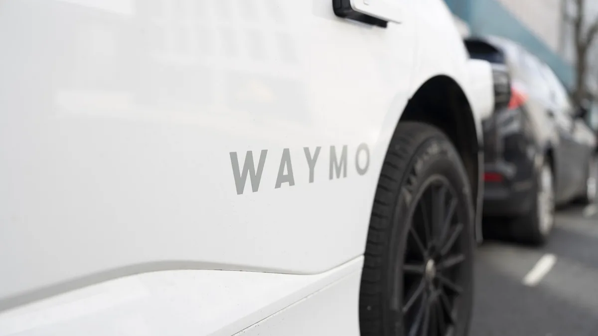 Autonomous vehicle approaching a managed emergency scene