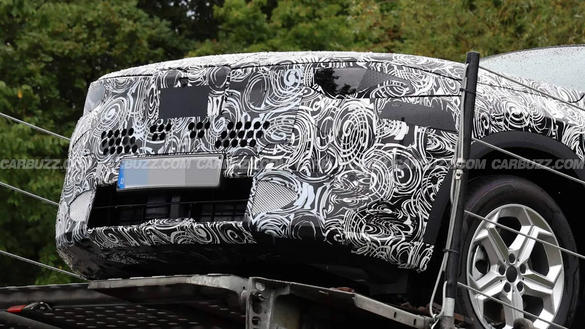 Camouflaged BMW X2 prototype driving during road testing