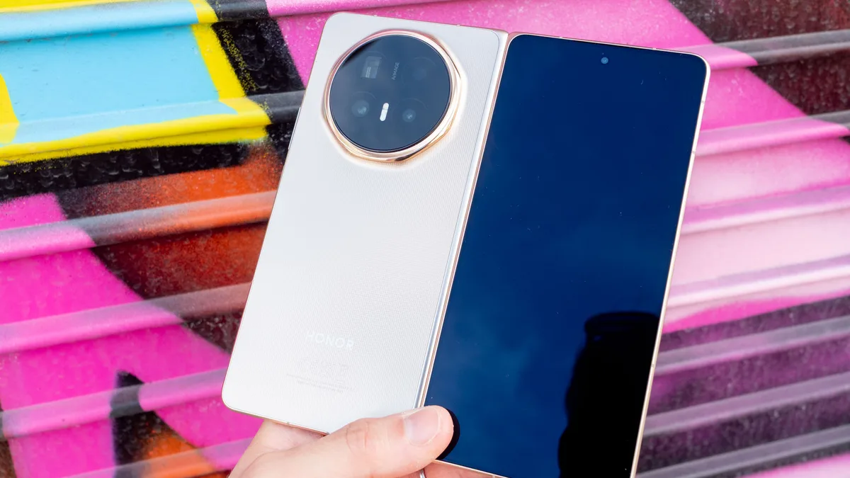Honor Magic V6 foldable phone shown as a compact photography workstation
