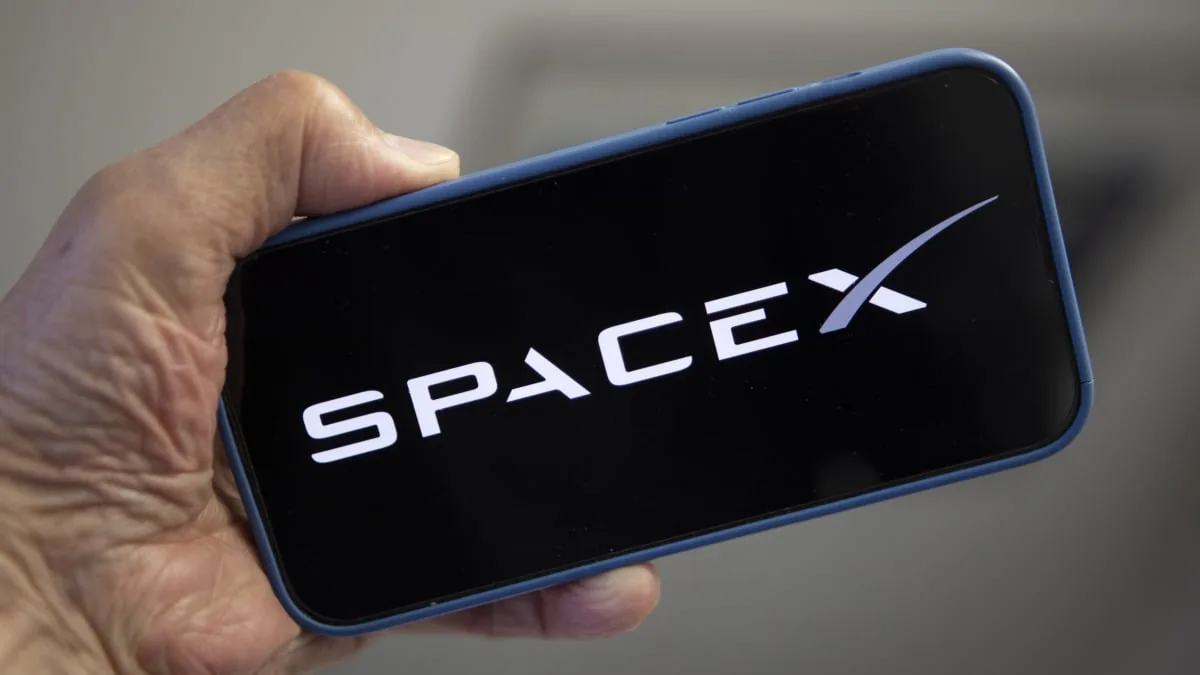 Concept image of a compact AI device beside a satellite-inspired interface
